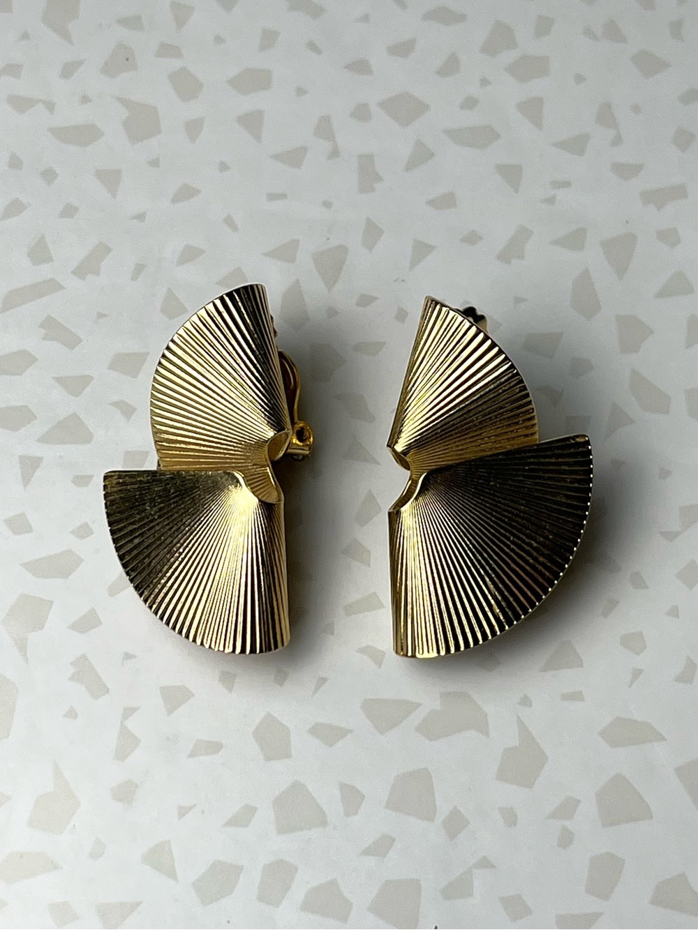 Gold Tone Geometric Twist Clip-on Earrings